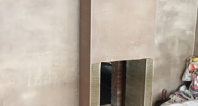 Tadelakt polished plaster fireplace and brick surround finish